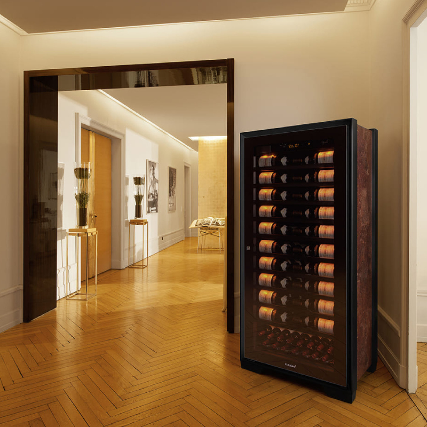In a luxurious French apartment, the large Royale aging wine cabinet naturally finds its place among the works of art.