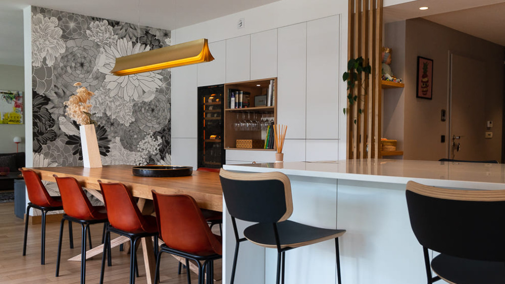 2-temperature wine cooler integrated into a custom cabinet in an open kitchen - for convivial moments