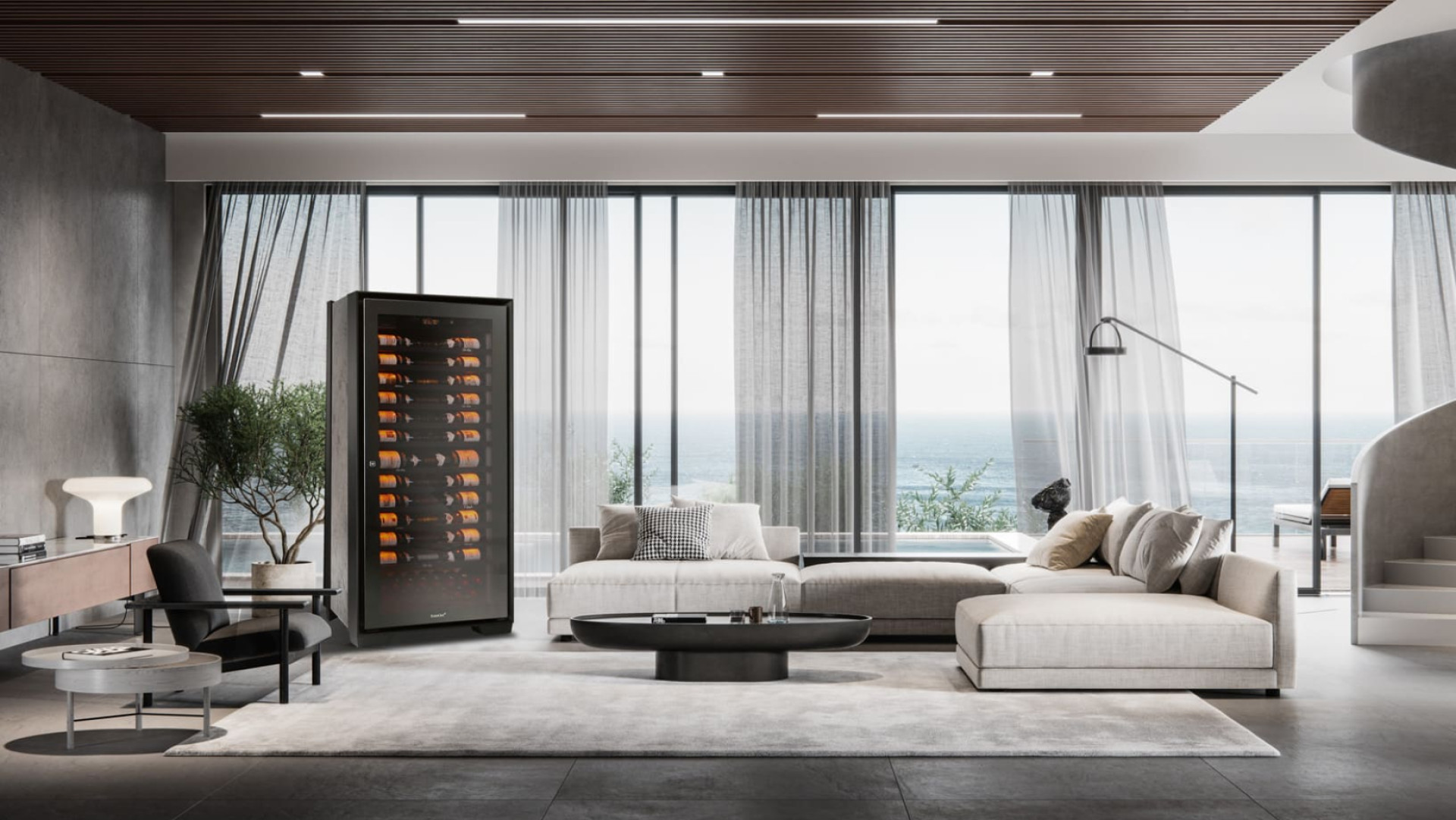The Royale wine cabinet installed in the exceptional living room of a luxury villa by the sea with an exceptional panorama. - EuroCave The Royale wine cabinet installed in the exceptional living room of a luxury villa by the sea with an exceptional panorama. - EuroCave