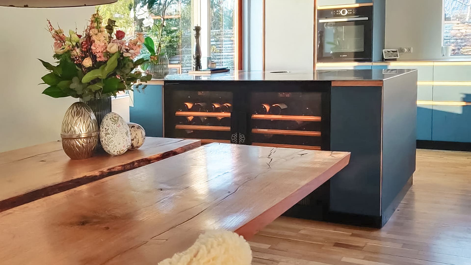 Two small built-in wine coolers in a kitchen island of a private house (a service wine cooler and an aging cabinet). Compact EuroCave