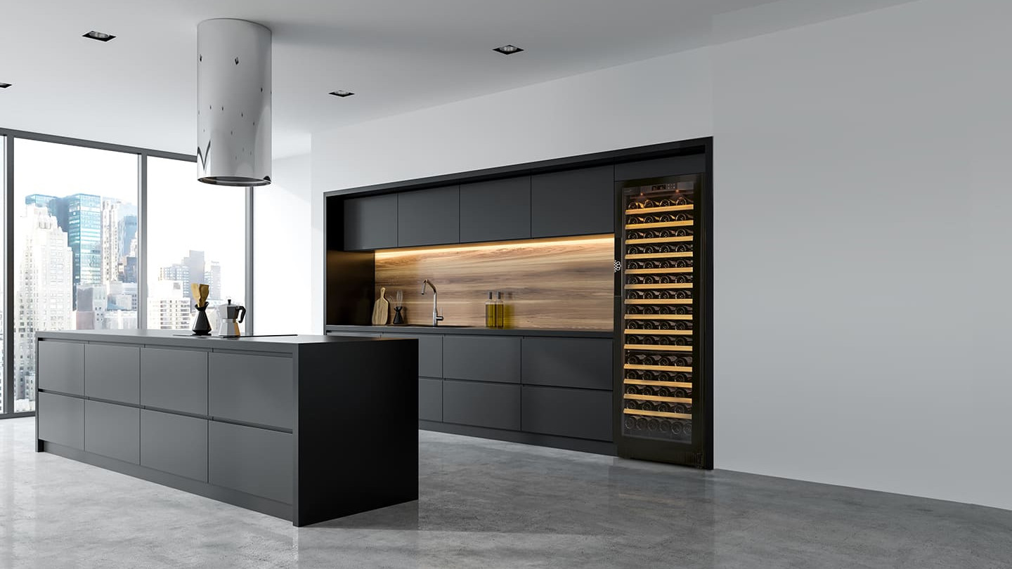 Large built-in multi-temperature wine cooler with glass door and sliding wooden shelves with a large storage capacity for wine bottles. Compact EuroCave