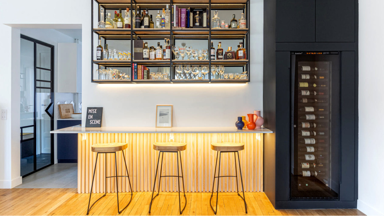 Living room bar area incorporating a large serving wine cooler built into the unit for perfect integration into the room.  Inspiration EuroCave