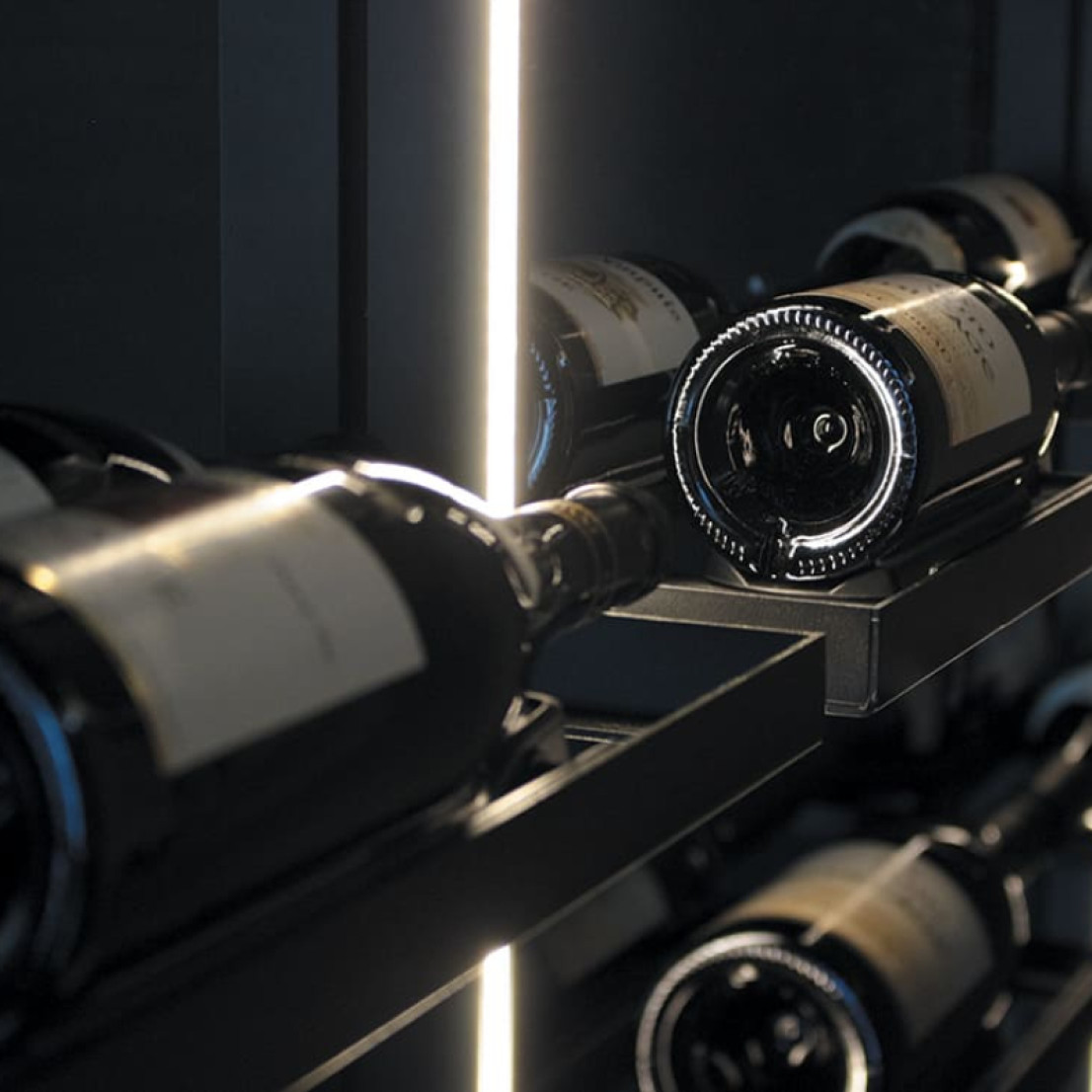 Backlit wine cellar storage in black metal to showcase your most beautiful bottles.