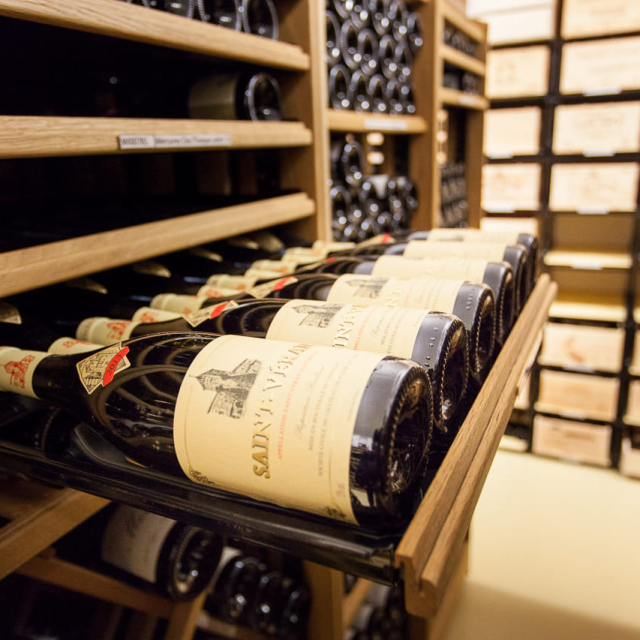 Bottle rack with sliding shelves to classify your individual wine collection with visible labels.