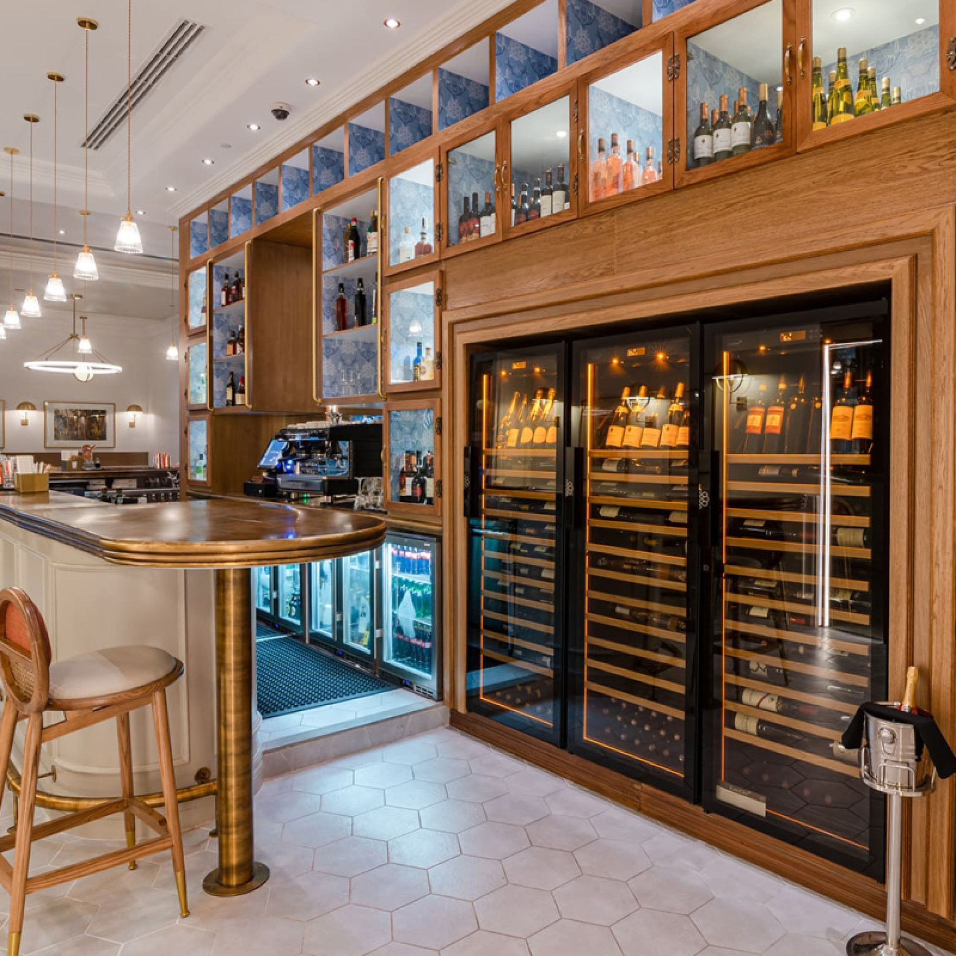 3 professional service cellars with integrated lighting as standard in a custom-made wooden unit to enhance the wine list in this restaurant.