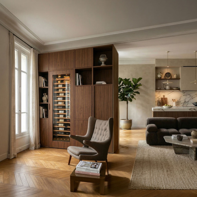 Large EuroCave Inspiration collection wine fridge with a technical glass door, seamlessly integrated into custom cabinetry in a warm-toned Haussmann-style living room.